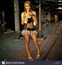 bangkok-street-scene-transvestite-in-the-morning-in-full-sun-in-khao-CP3AA5.jpg