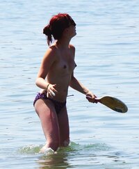 young_redhead_topless_at_the_beach_6.jpg